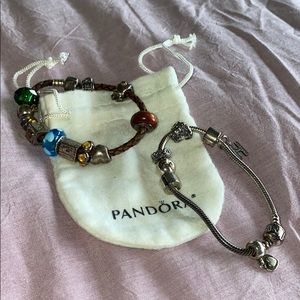 TWO PANDORA CHARM BRACLETS
